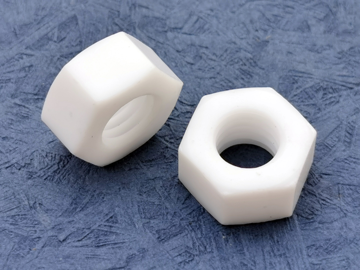 Tuercas hexagonales de PTFE resistentes a productos químicos de alta temperatura Tuercas hexagonales de PTFE resistentes a productos químicos de alta temperatura
