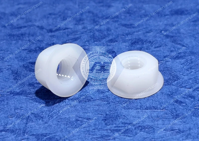 Tuercas con brida hexagonal de nailon 66 m&eacute;trico blanco